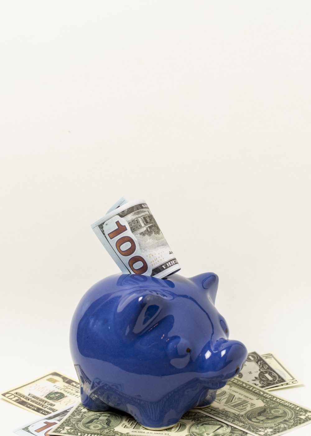 blue-piggy-bank-with-copy-space-grey-background